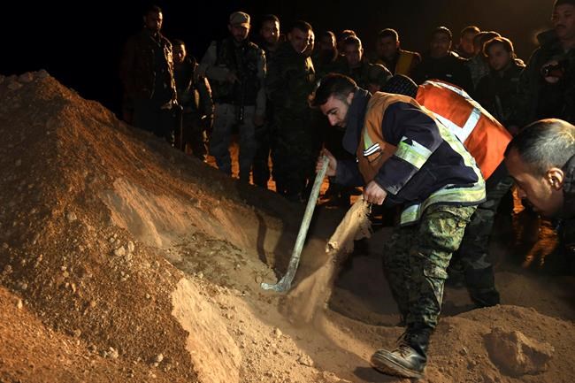 Watchdog: Syrian group uncovering IS mass graves needs help | iNFOnews.ca CP1922616867