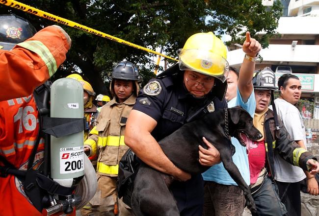 Fire hits 21-story Manila building; 1 dead and 5 injured | iNFOnews.ca Fire hits 21-story Manila building; 1 dead and 5 injured | iNFOnews.ca