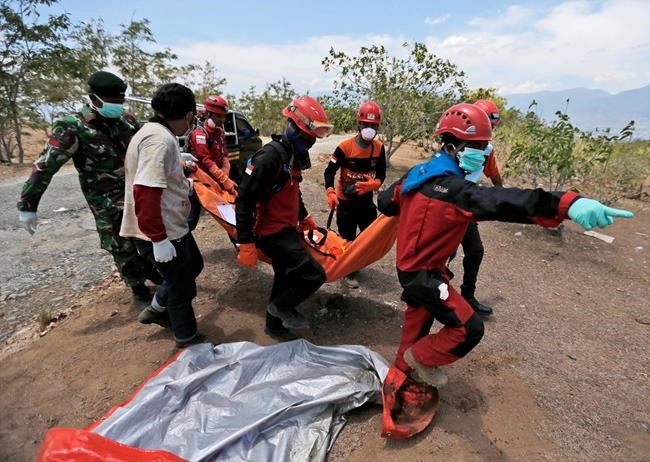 At mass grave above Indonesian city, many questions linger | iNFOnews.ca At mass grave above Indonesian city, many questions linger | iNFOnews.ca