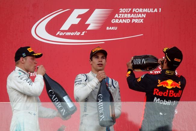 Rivals Hamilton, Vettel clash as Ricciardo wins chaotic race | iNFOnews.ca