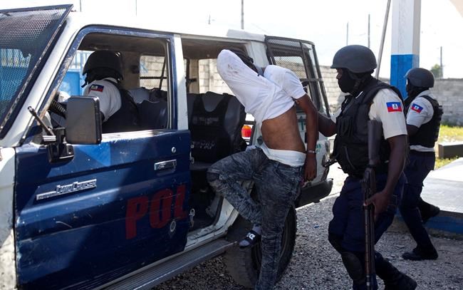 Witnesses: Men in police garb massacred civilians in Haiti | iNFOnews.ca
