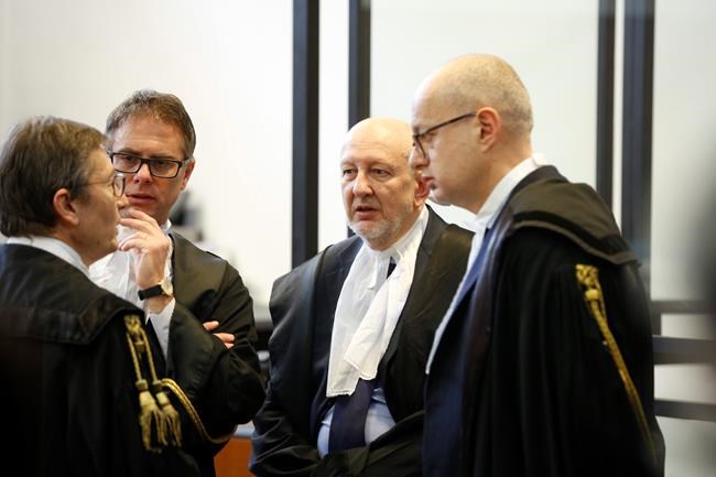Trial begins for jailed American pals in policeman's slaying | iNFOnews.ca