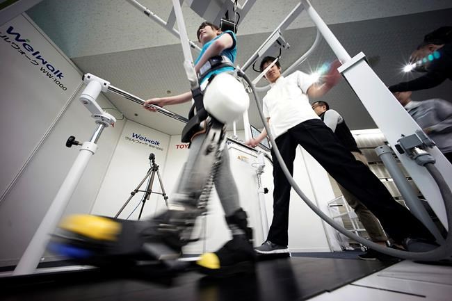 Toyota shows robotic leg brace to help paralyzed people walk | iNFOnews.ca