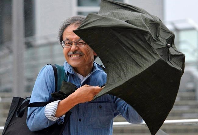 Flights cancelled but no major damage as typhoon soaks Japan | iNFOnews.ca Flights cancelled but no major damage as typhoon soaks Japan | iNFOnews.ca