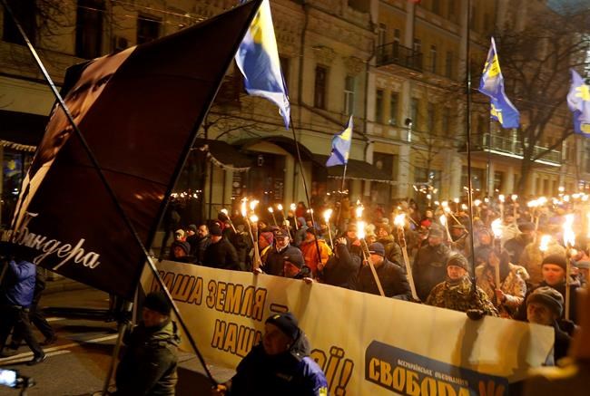 Torchlight parade in Kyiv honours Nazi-linked nationalist | iNFOnews.ca CP1993669730