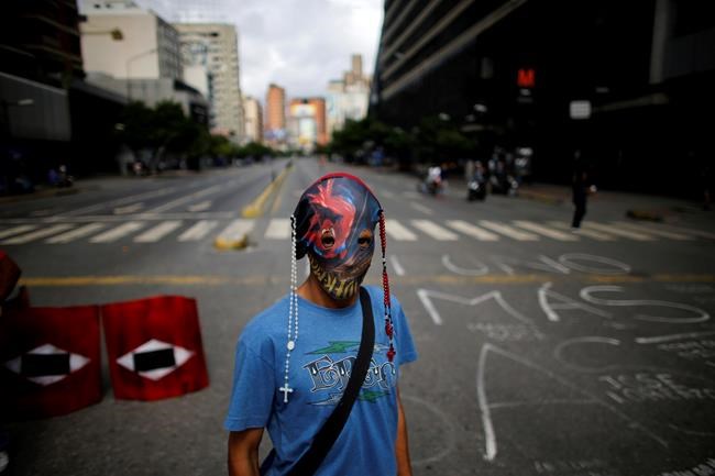 Deaths in Venezuela unrest hit 103 as polarizing vote nears | iNFOnews.ca CP1163453050