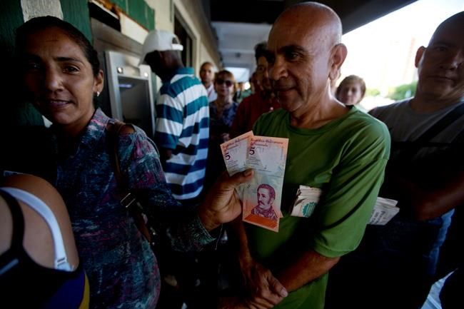 Venezuelans confused over new bills under economic overhaul | iNFOnews.ca Venezuelans confused over new bills under economic overhaul | iNFOnews.ca