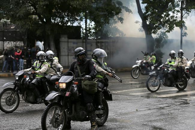 The Latest: Venezuela leader promotes investigated officer | iNFOnews.ca