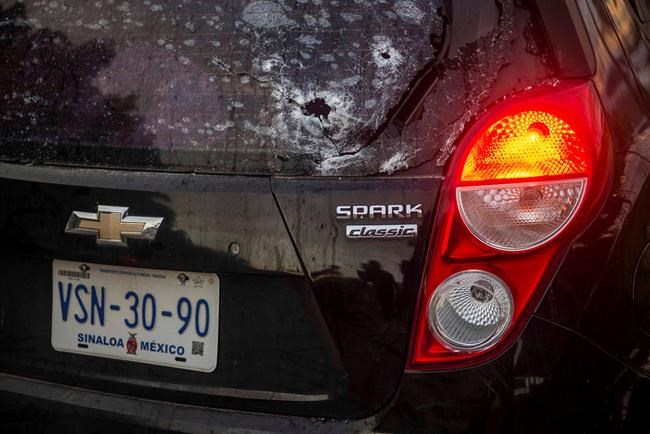 Gunbattles rattle Mexican city after troops find Chapo's son | iNFOnews.ca