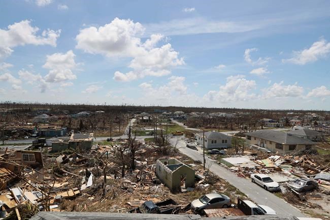 Silence, devastation mark Bahamas town; but some are staying | iNFOnews.ca