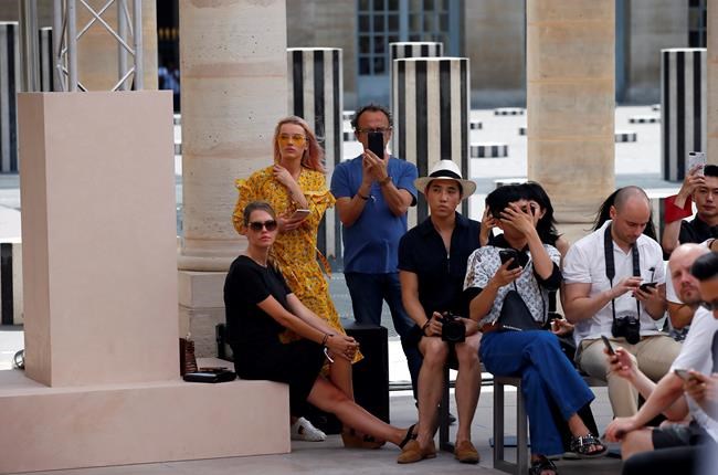 Louis Vuitton channels escapism at sweltering Paris menswear | iNFOnews.ca Louis Vuitton channels escapism at sweltering Paris menswear | iNFOnews.ca