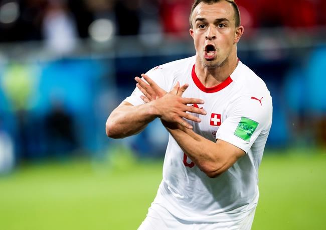 Xhaka and Shaqiri score for Swiss, make Albanian symbol | iNFOnews.ca Xhaka and Shaqiri score for Swiss, make Albanian symbol | iNFOnews.ca