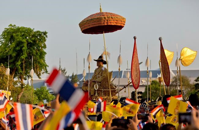 Newly crowned Thai king carried in spectacular procession | iNFOnews.ca CP846431783