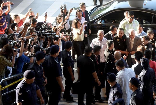 Malaysia ex-PM, ex-treasury, spy chiefs charged with graft | iNFOnews.ca