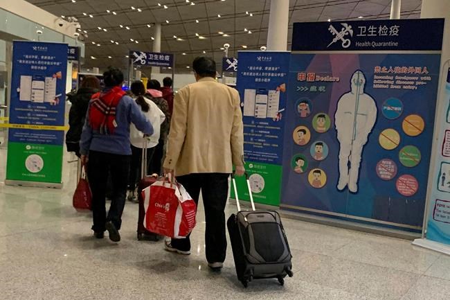 US to screen airline passengers from China for new illness | iNFOnews.ca CP586126916