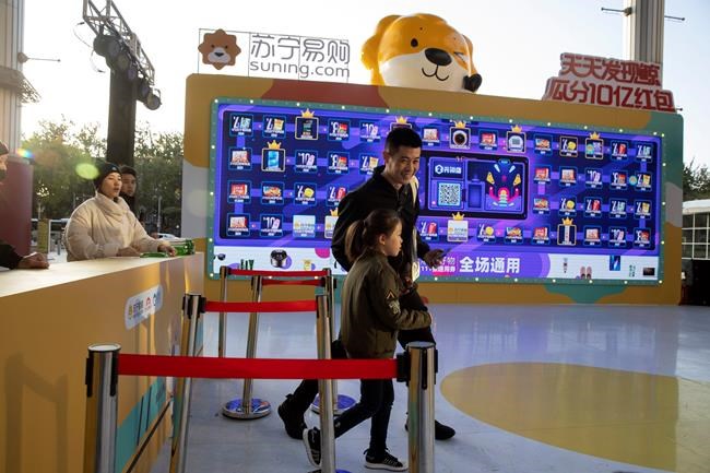 China's Alibaba, JD report booming Singles Day sales | iNFOnews.ca CP803704353