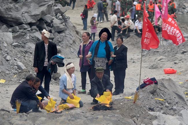 Scores missing in massive China landslide; 10 bodies found | iNFOnews.ca
