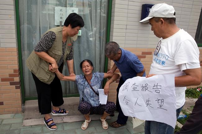 Relatives refuse to accept report on missing Malaysian plane | iNFOnews.ca CP1789901369