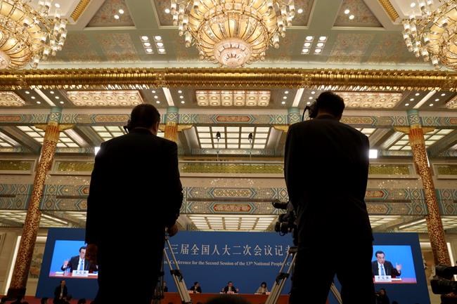 China's premier denies Beijing tells companies to spy | iNFOnews.ca China's premier denies Beijing tells companies to spy | iNFOnews.ca