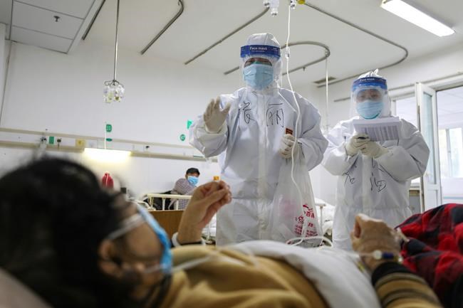 Virus cases surge after China revises way count is tallied | iNFOnews.ca