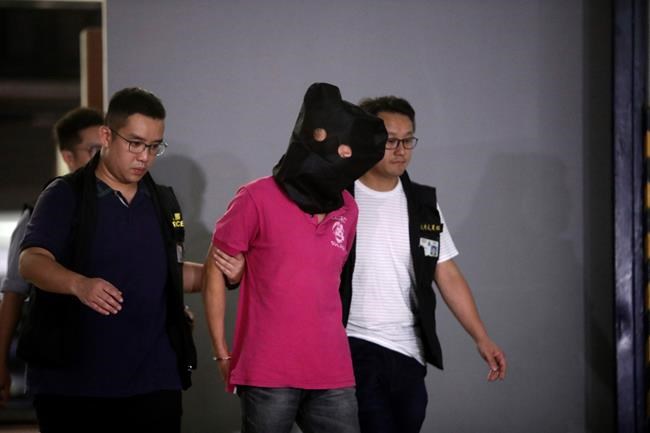 Who are the men in white behind Hong Kong's mob attack? | iNFOnews.ca
