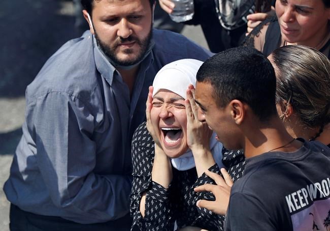 A week after blast, Beirut pauses to remember the dead | iNFOnews.ca CP950308718