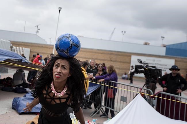The Latest: Migrants in caravan start seeking US asylum | iNFOnews.ca