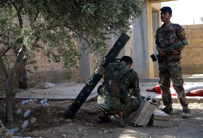 US-backed Syrian fighters now control almost half of IS city | iNFOnews.ca