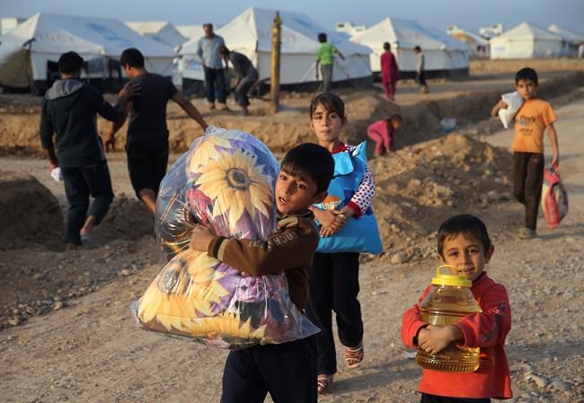 Iraqi troops enter town of famed ancient ruins near Mosul | iNFOnews.ca CP353608417