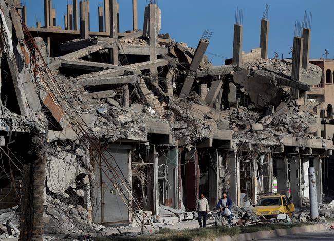 Rights group says US-led coalition destroyed Syrian city | iNFOnews.ca Rights group says US-led coalition destroyed Syrian city | iNFOnews.ca