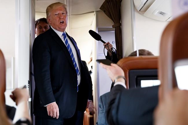 The Latest: Trump praises EPA head, is looking into reports | iNFOnews.ca CP1736236704