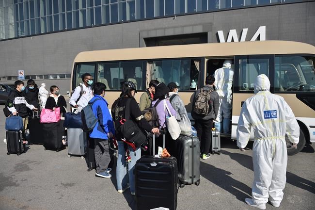 The Latest: Official says Canada, US working on travel curbs | iNFOnews.ca