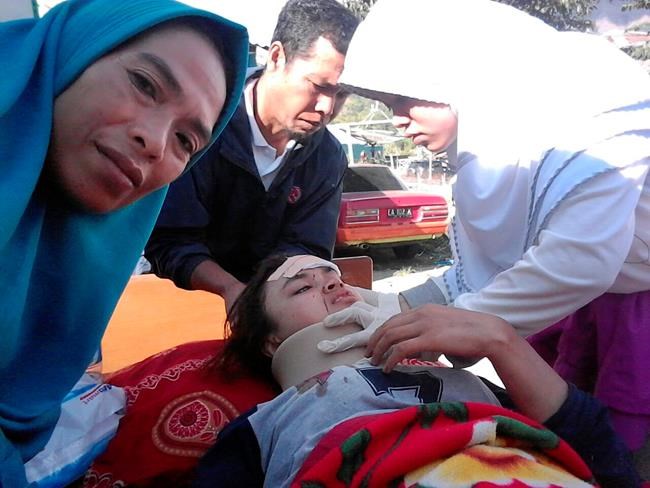 The Latest: 14 dead, 162 injured in Indonesia quake | iNFOnews.ca