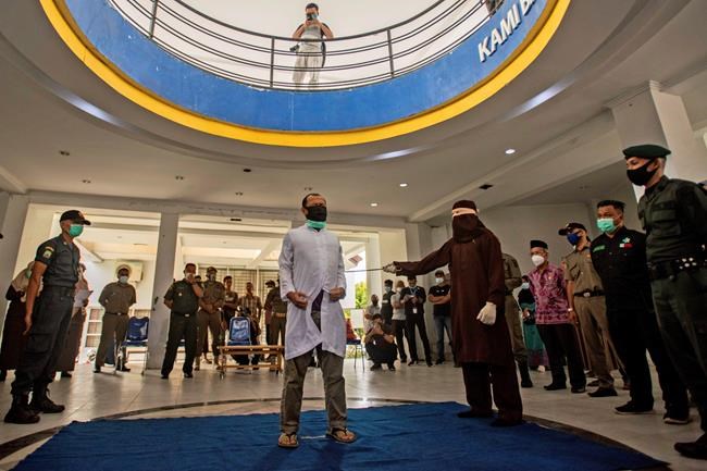 2 men caned 77 times for having sex in Indonesia's Aceh | iNFOnews.ca 2 men caned 77 times for having sex in Indonesia's Aceh | iNFOnews.ca