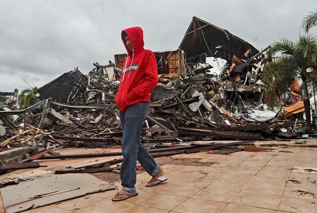 Damaged roads, lack of gear hinder Indonesia quake rescue | iNFOnews.ca Damaged roads, lack of gear hinder Indonesia quake rescue | iNFOnews.ca