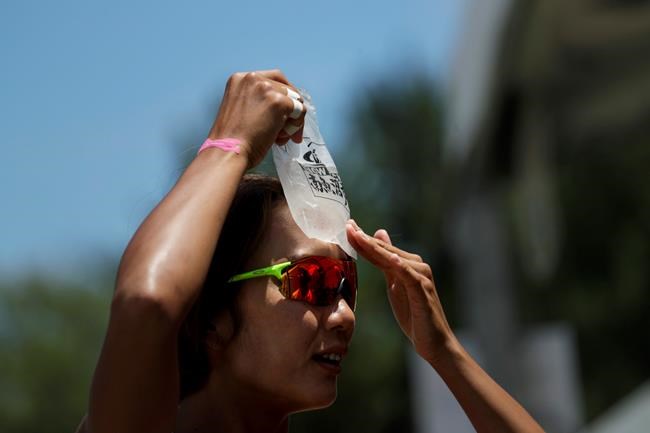 Hoses, ice packs help tame Tokyo heat before the Olympics | iNFOnews.ca