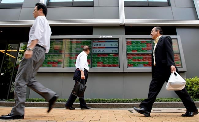 Global stocks sink after Fed's hike signal | iNFOnews.ca