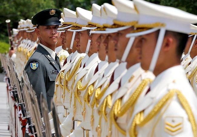 Image of Asia: A final check before honour guard is inspected | iNFOnews.ca
