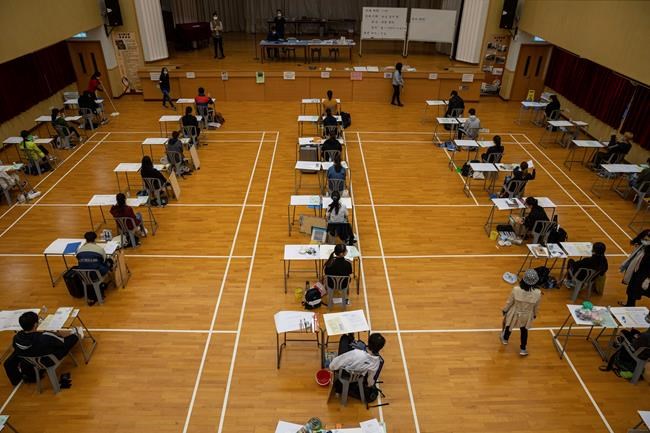 Hong Kong university entrance exams begin with virus steps | iNFOnews.ca