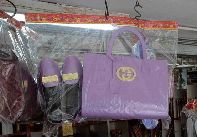 Gucci sorry for warning to Hong Kong funeral offering shops | iNFOnews.ca