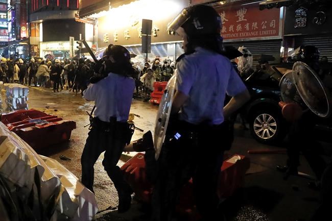 Police defend warning shot as Hong Kong divide widens | iNFOnews.ca