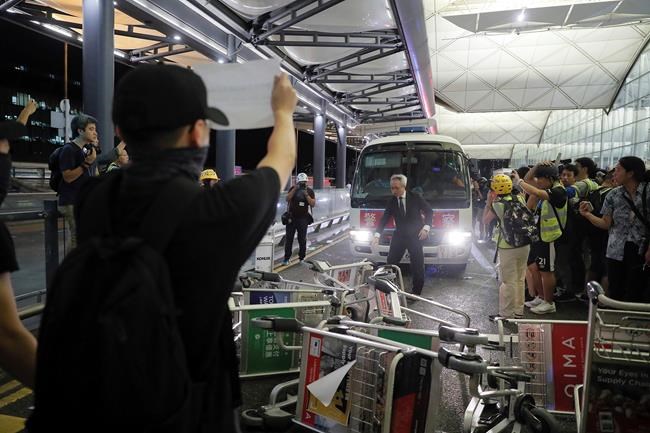 Mob violence marks 2nd day of protests at Hong Kong airport | iNFOnews.ca Mob violence marks 2nd day of protests at Hong Kong airport | iNFOnews.ca