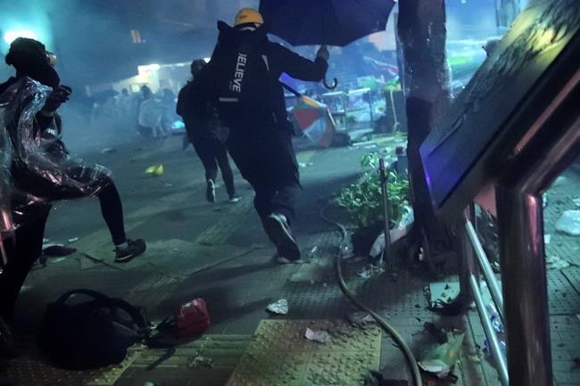 The Latest: Tear gas drives back protesters trying to leave | iNFOnews.ca The Latest: Tear gas drives back protesters trying to leave | iNFOnews.ca