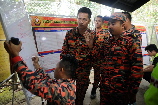 More bodies found on Malaysia's highest peak as quake death toll rises to 13, with 6 missing | iNFOnews.ca CP33381124