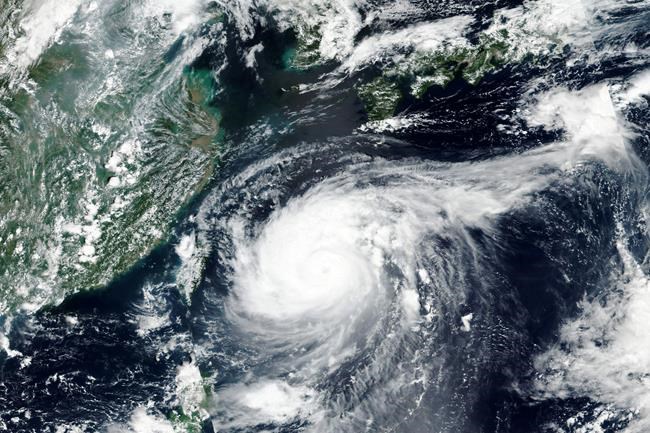 Strong typhoon sweeps southern Japan, heads to Koreas | iNFOnews.ca