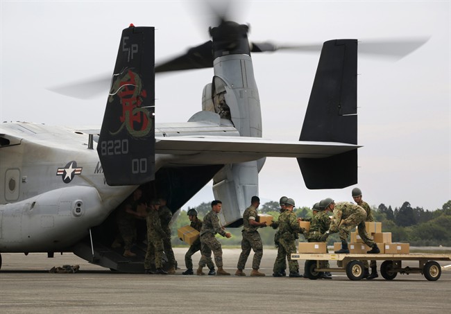 Searchers find body in twin Japan quakes, raising toll to 45 | iNFOnews.ca CP37115770