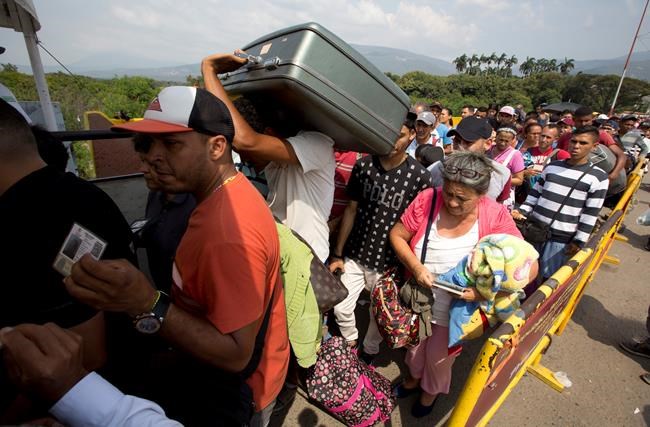 US to supply emergency food, medicine to Venezuelan migrants | iNFOnews.ca CP344988342