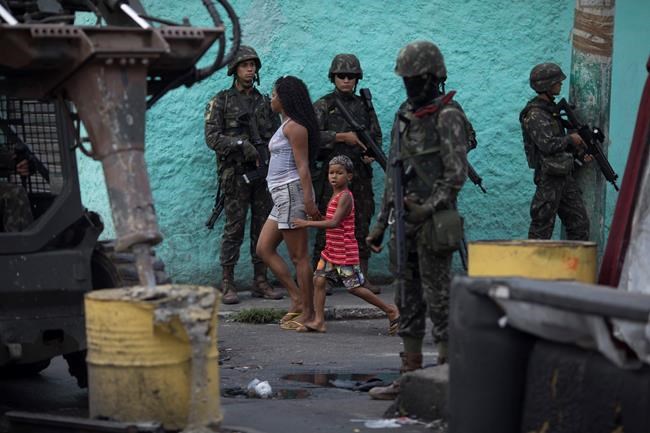 Rio police and military arrest 23 in pre-Carnival raids | iNFOnews.ca