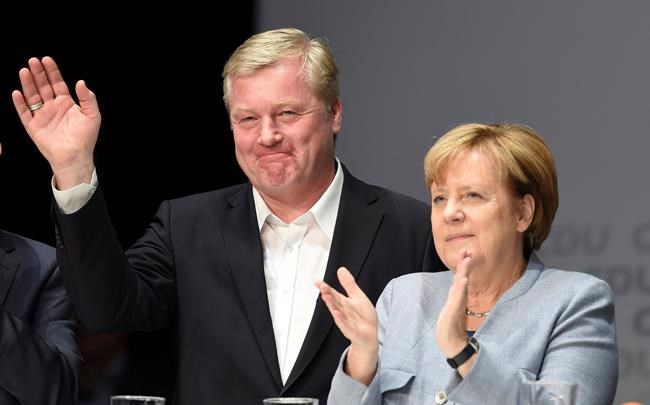 Merkel predicts tight race in German regional vote | iNFOnews.ca