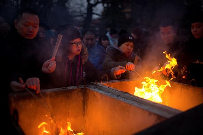 Asia welcomes Year of the Pig with banquets, temple visits | iNFOnews.ca Asia welcomes Year of the Pig with banquets, temple visits | iNFOnews.ca